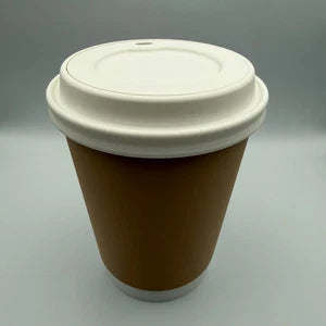 Coffee cup shaped trash can with a cream flipping lid